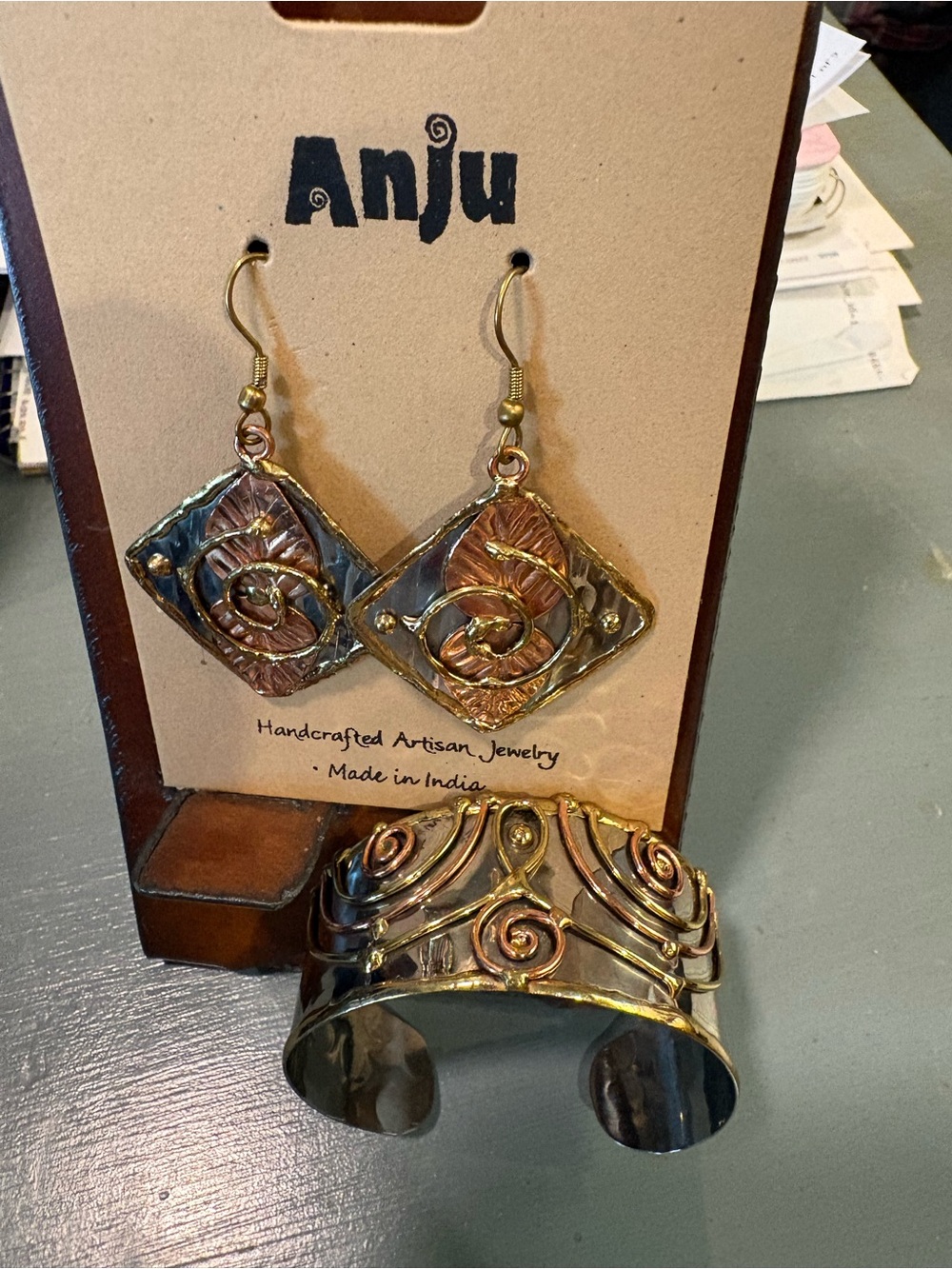 Anju Gold-Tone Swirl Dangle Earrings and matching cuff Artisan Jewelry